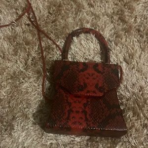 Love this red purse perfect for the holidays